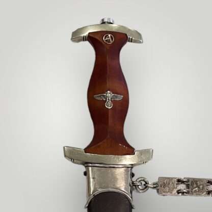 NSKK chained dagger by Emil Voos Waffenfabrik, Solingen, wooden handle.