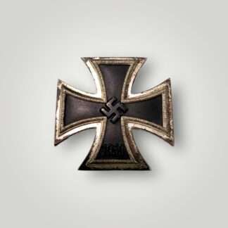 Iron Cross 1st Class by Wächtler & Lange, with a nice blackened core and ribbed border, with the raised swastika in the centre with institution date 1939 below.