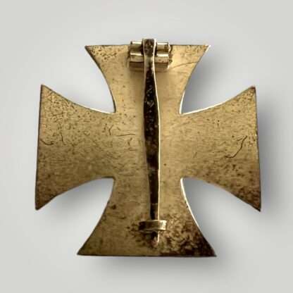 Reverse image of a Iron Cross 1st Class by Wächtler & Lange, with block hinge and flat wire catch.