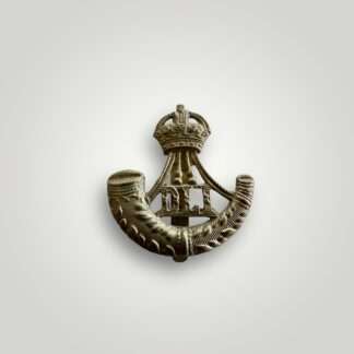 A British WW2 Durham Light Infantry cap badge, die stamp construction in white metal.