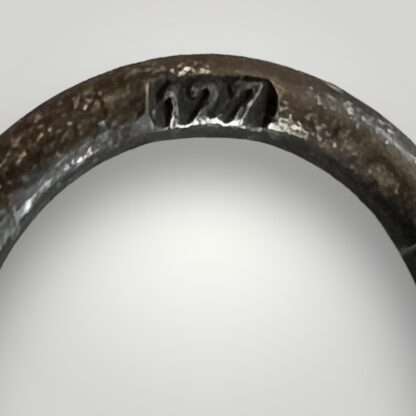 A German WW2 Eastern Front medal ring marked "127" oattributed to the following manufacturer Moritz Hausch of Pforzheim.
