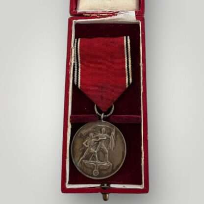 A WW2 German Anschluss medal with presentation case.