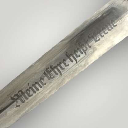 An original SS Dagger blade etched with the SS motto "Meine Ehre heißt Treue".