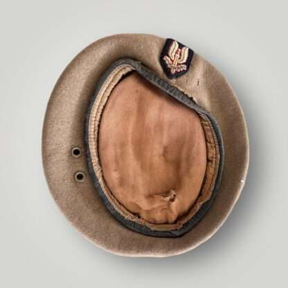 An original British SAS (Special Air Service) Beret and badge circa 1950s-60s, constructed in biege wool.