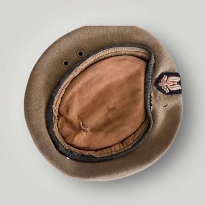 An original British SAS (Special Air Service) Beret and badge circa 1950s-60s, constructed in biege wool.