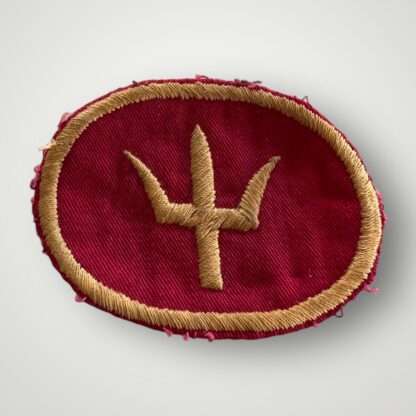 A British Army WW2 44th Division formation patch, machine embroidered in yellow thread on red cotton backing.