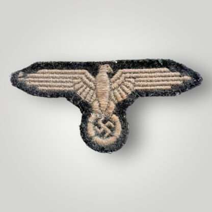 An original Waffen-SS Sleeve badge French made, machine embroidered with silver wire on black wool backing.