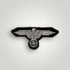 A Waffen-SS EM/NCO's Sleeve Badge, machine embroidered with silver grey thread on black wool backing.