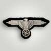 A Waffen-SS EM/NCO's Sleeve Badge, machine embroidered with silver grey thread on black wool backing.