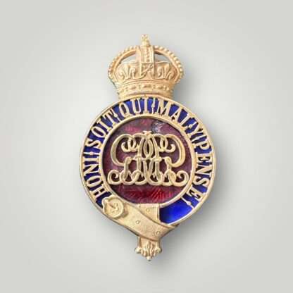 An extremly rare Grenadier Guards Officer's George V pagri badge, constructed in fine gilt with enamel backing.