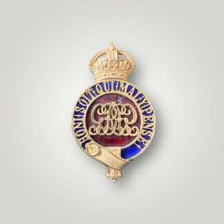 An extremly rare Grenadier Guards Officer's George V pagri badge, constructed in fine gilt with enamel backing.