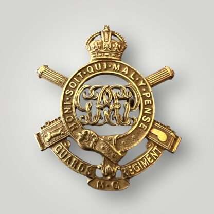 An extremly rare British WW1 Guards Machine Gun Regiment Officers cap badge, constructed in gilt metal with nice patina.