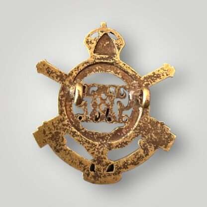 Reverse image of an extremly rare British WW1 Guards Machine Gun Regiment Officers cap badge, constructed in gilt complete with prongs.