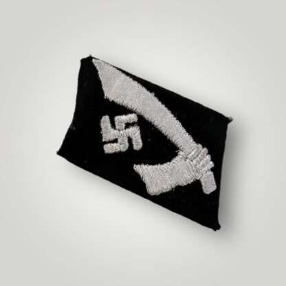 A 13th Waffen-SS Mountain Division Handschar collar tab, embroidered with silver-grey thread on typical SS black wool.