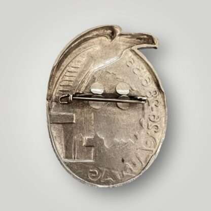 Reverse image of a NSDAP 1936 Koblenz-Trier Provincial day badge, constructed in aluminum.