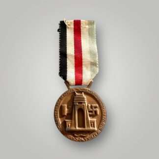 A WW2 German German Italian Campaign Medal in bronze, complete with the original ribbon.