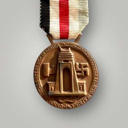 A WW2 German German Italian Campaign Medal in bronze, complete with the original ribbon.