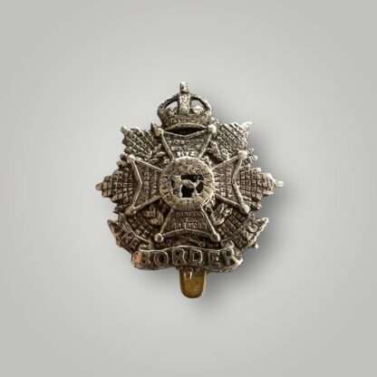 A rare original Border Regiment 1902 - 1905 Edwardian cap badge, constructed in white metal.