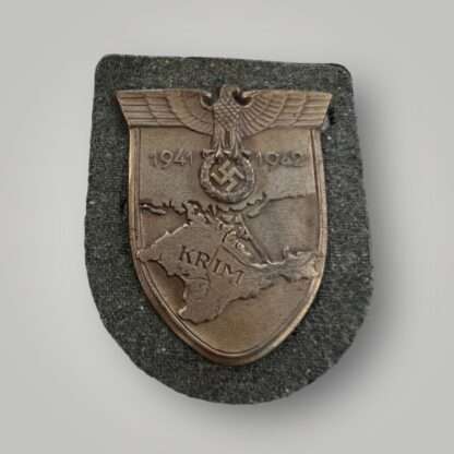 An original Heer Krim Campaign Shield magnetic version with bronze finish with beautiful patina,