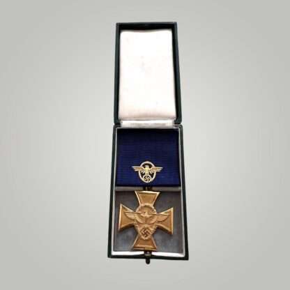 A WW2 German Police Long Service Medal 25 Years with presentation box, die struck alloy constructed with gilt finish complete with blue ribbon embroidered with police insignia.