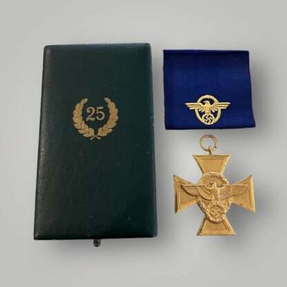 A WW2 German Police Long Service Medal 25 Years with presentation box, die struck alloy constructed with gilt finish complete with blue ribbon embroidered with police insignia.