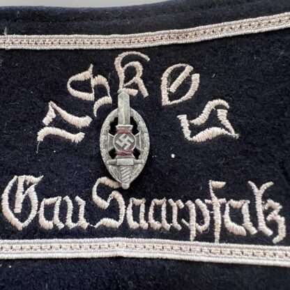 An original NSKOV WW2 Armband Gau Saarpfak, constructed in dark blue wool.
