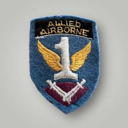 An image of a First Allied Airborne WW2 formation badge, machine embroidered.