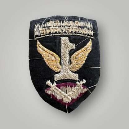 Reverse image of a First Allied Airborne WW2 formation badge, machine embroidered.