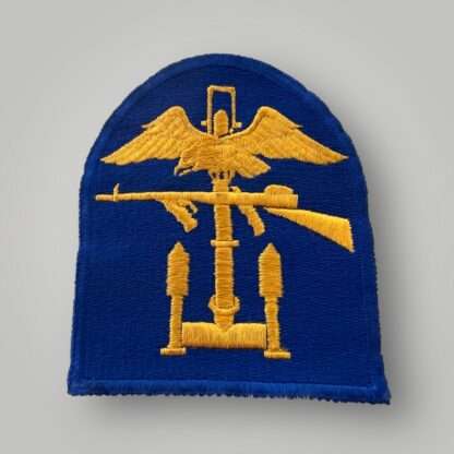 An original US WW2 Army Engineer Special Brigade insignia, machine embroidered in yellow and light blue thread.