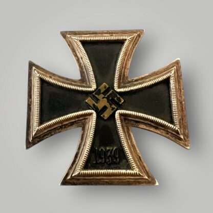 A desirable Iron Cross EK1 marked L/58, multi-piece construction with a magnetic blackened iron core. The obverse has a nice ribbed border and frame, with a raised mobile swastika in the centre with the re-institution date below "1939".