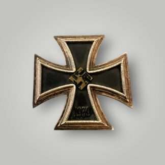 A desirable Iron Cross EK1 marked L/58, multi-piece construction with a magnetic blackened iron core. The obverse has a nice ribbed border and frame, with a raised mobile swastika in the centre with the re-institution date below "1939".