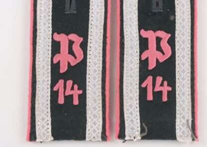 A rare early set of Heer Panzerjäger Regiment 14 shoulder boards for Unteroffizier, constructed on dark green wool with pink coloured pipping with silver tress border and a gothic style "P" in the centre with the number 14 below in pink thread.