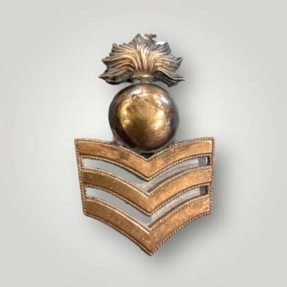 An Royal Marines Artillery Sergeant Undress Cap Badge 1874 - 1903, constructed in brass.