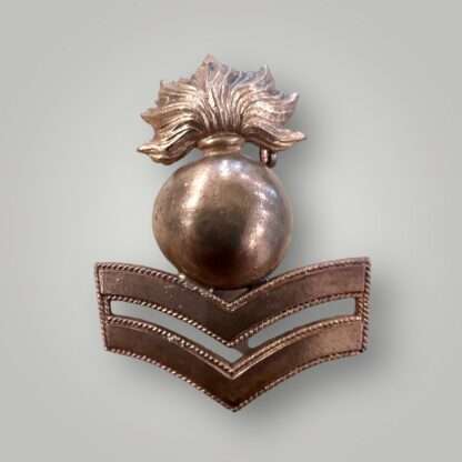 A Royal Marines Artillery Bombardier Undress Cap Badge 1874 - 1903, constructed in brass.