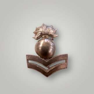 A Royal Marines Artillery Bombardier Undress Cap Badge 1874 - 1903, constructed in brass.