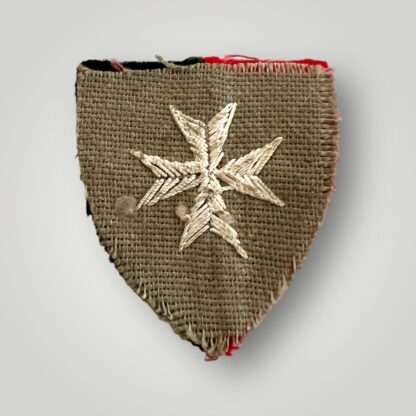 Reverse image of an original British WW2 68 (North Midland) Heavy Anti-Aircraft Regiment RA (TA) formation badge, machine embroidered.