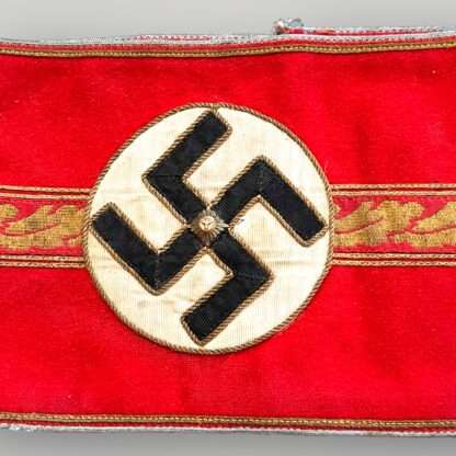 This NSDAP Political Leader Ortsgruppe-Level armband worn by political leaders at local level for the Third Reich.