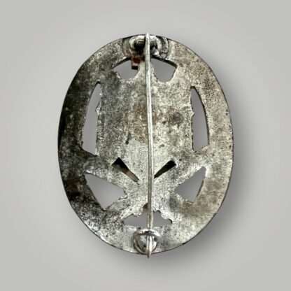 Reverse image of a Heer General Assault Badge unmarked constructed in silvered-plated zinc.