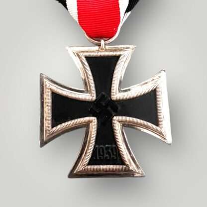 An original Iron Cross 2nd Class Medal unmarked, constructed with silver frame and magnetic iron core.