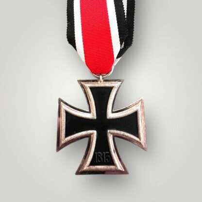 Reverse image of an Iron Cross 2nd Class Medal unmarked, constructed with silver frame and magnetic iron core.