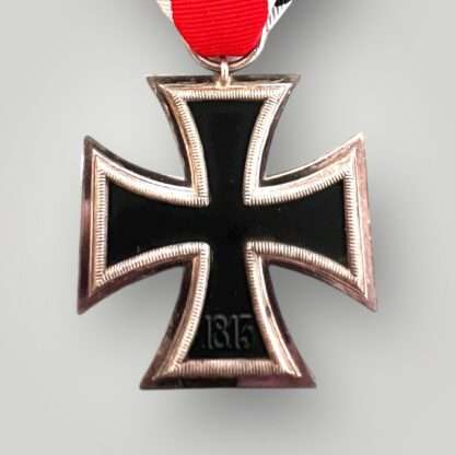 Reverse image of an Iron Cross 2nd Class Medal unmarked, constructed with silver frame and magnetic iron core.