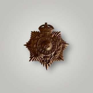 An original Royal Marines helmet plate circa 1905-1953, die stamped in brass.