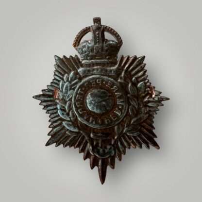 Reverse image of an Royal Marines helmet plate circa 1905-1953, die stamped in brass with brass lugs.