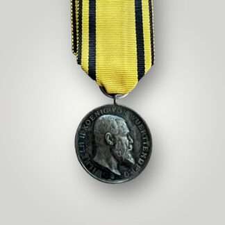 An original Wurttemberg Silver Military Merit Medal (Württemberg Militärverdienstmedaille) complete with original ribbon.