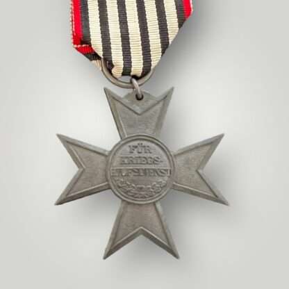 Reverse image of a Prussian WW1 Merit Cross for War Aid medal, die struck in zinc complete with suspension ring and original ribbon.