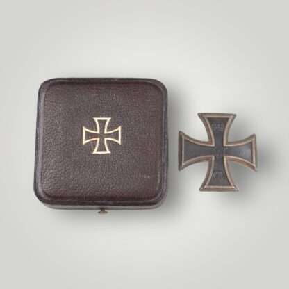 A WW1 German Iron Cross 1st Class 1914 with early presentation case, three-part construction with magnetic iron core, with beautiful patina.