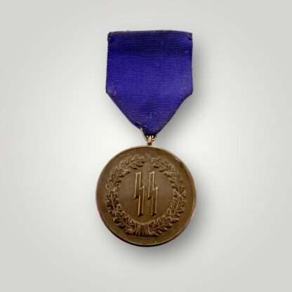 An SS Long Service Medal four years, constructed in tombak with tear drop suspension ring.