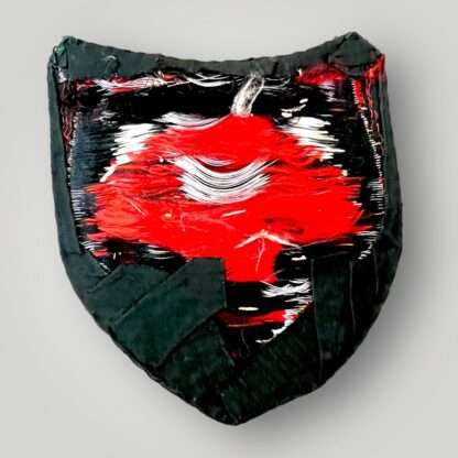 Reverse image of original Heer Artillery Flag Bearers Sleeve Badge, flat Bevo weave construction in red, black, and aluminium thread on green rayon backing.