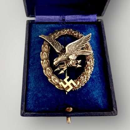 An early original Luftwaffe Radio Operator & Air Gunner badge By C.E. Juncker with presentation case, constructed in tombak.