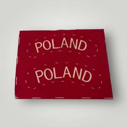 A set of Free Polish Army WW2 shoulder titles, screen printed on cotton fabric, uncut and in unissued condition.